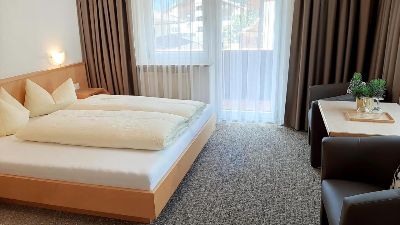 Hotel Garni Bergland ノイシュティフト・イム・シュトゥーバイタール エクステリア 写真
